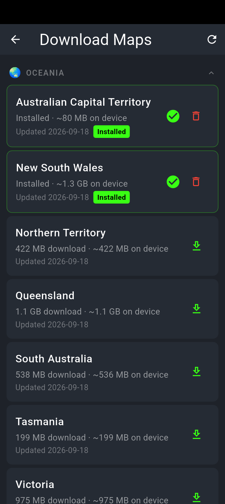 The Download Maps screen, Oceania expanded: Australian Capital Territory and New South Wales installed with a green tick and a bin, then Northern Territory, Queensland, South Australia, Tasmania and Victoria each showing a download size and a green download arrow.