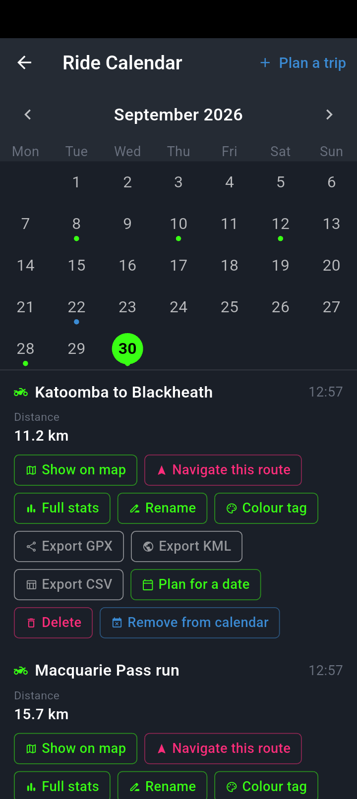 The Ride Calendar month view for September 2026 with dots under the days that have rides and today ringed in green, and below it the card for a planned trip showing its distance and the eleven actions from Show on map to Remove from calendar.
