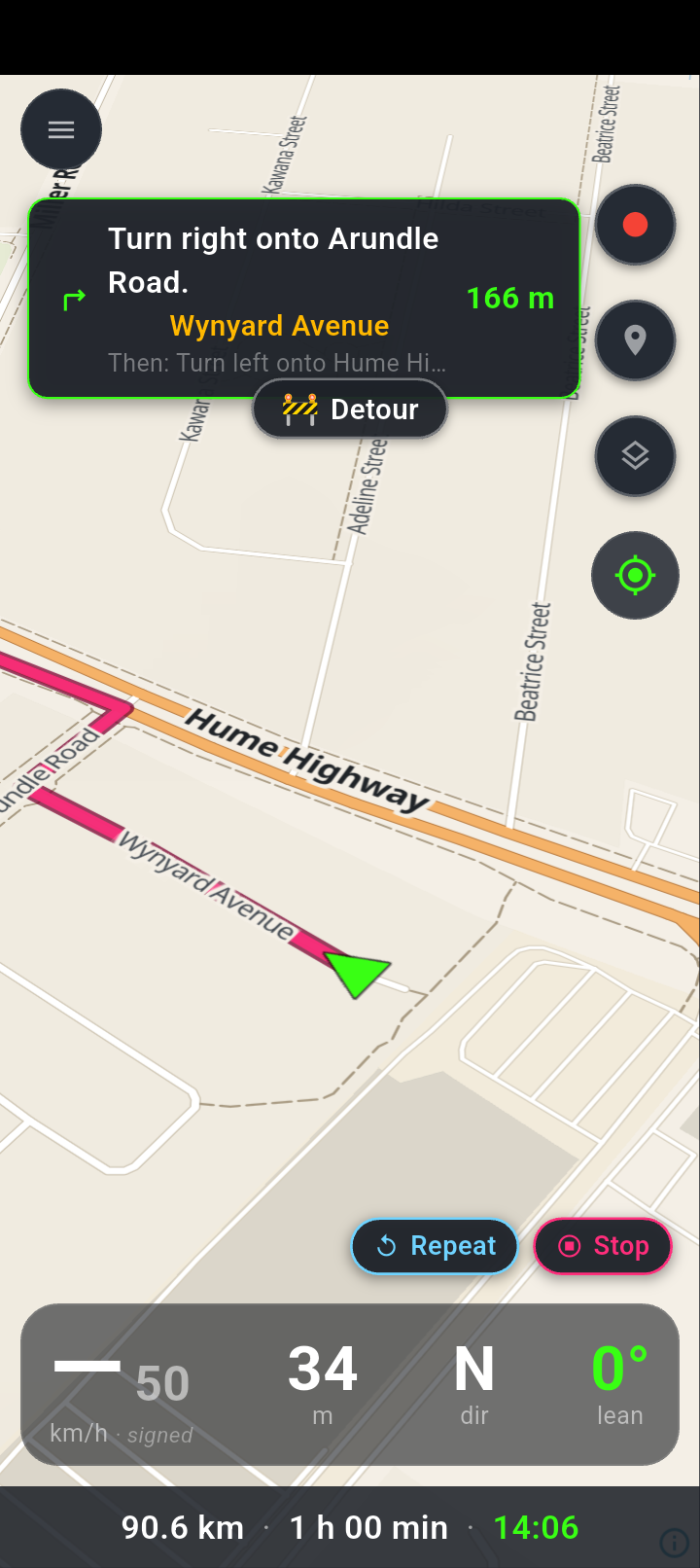 The Detour pill, a roadworks icon and the word Detour, sitting centred just below the turn card during navigation, with the side buttons visible after a tap on the map.